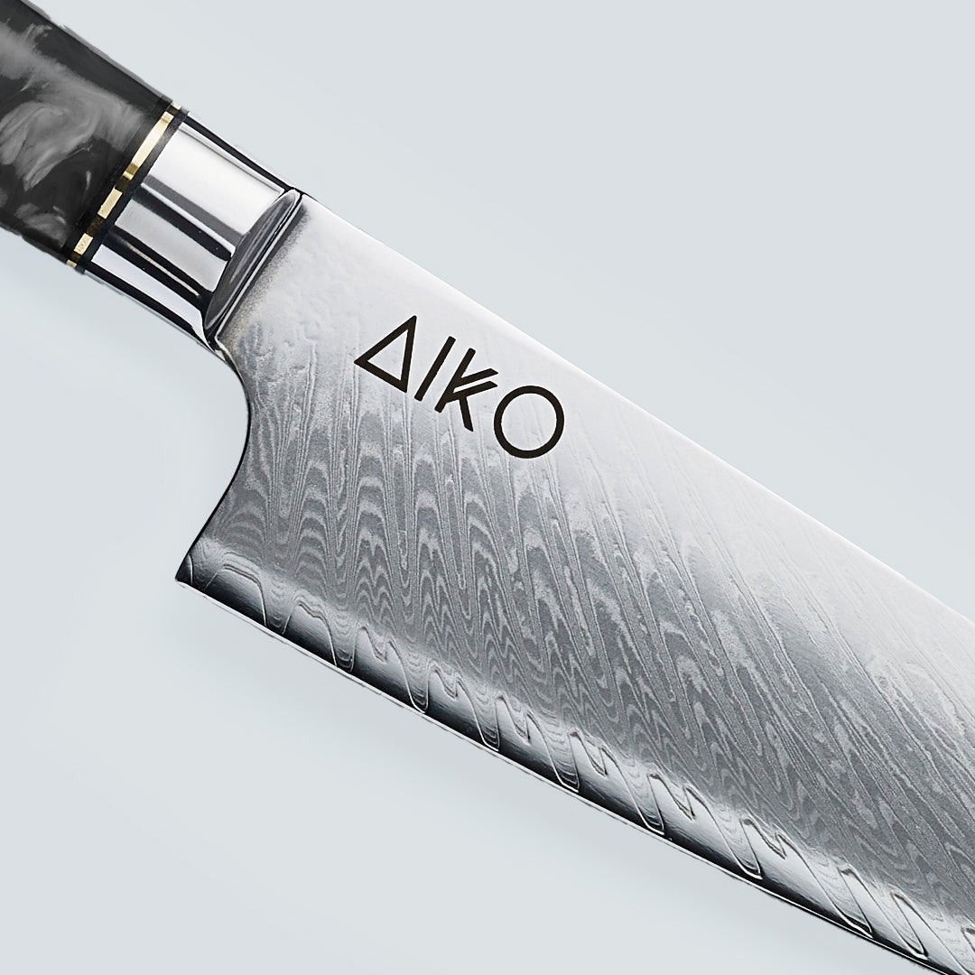 Aiko sort (あいこ, アイコ) Damaskus stålkniv med farvet sort harpikshåndtag