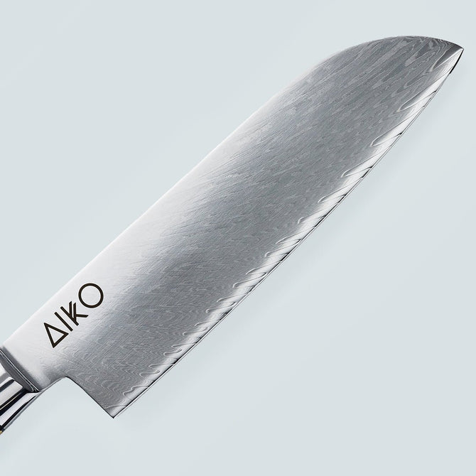 Couteau en acier Damas noir Aiko avec manche en résine noire colorée